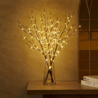 LED Illumination BrightBranch - Yelopi - Oak Tree with LED light on, inside a vase on a table.