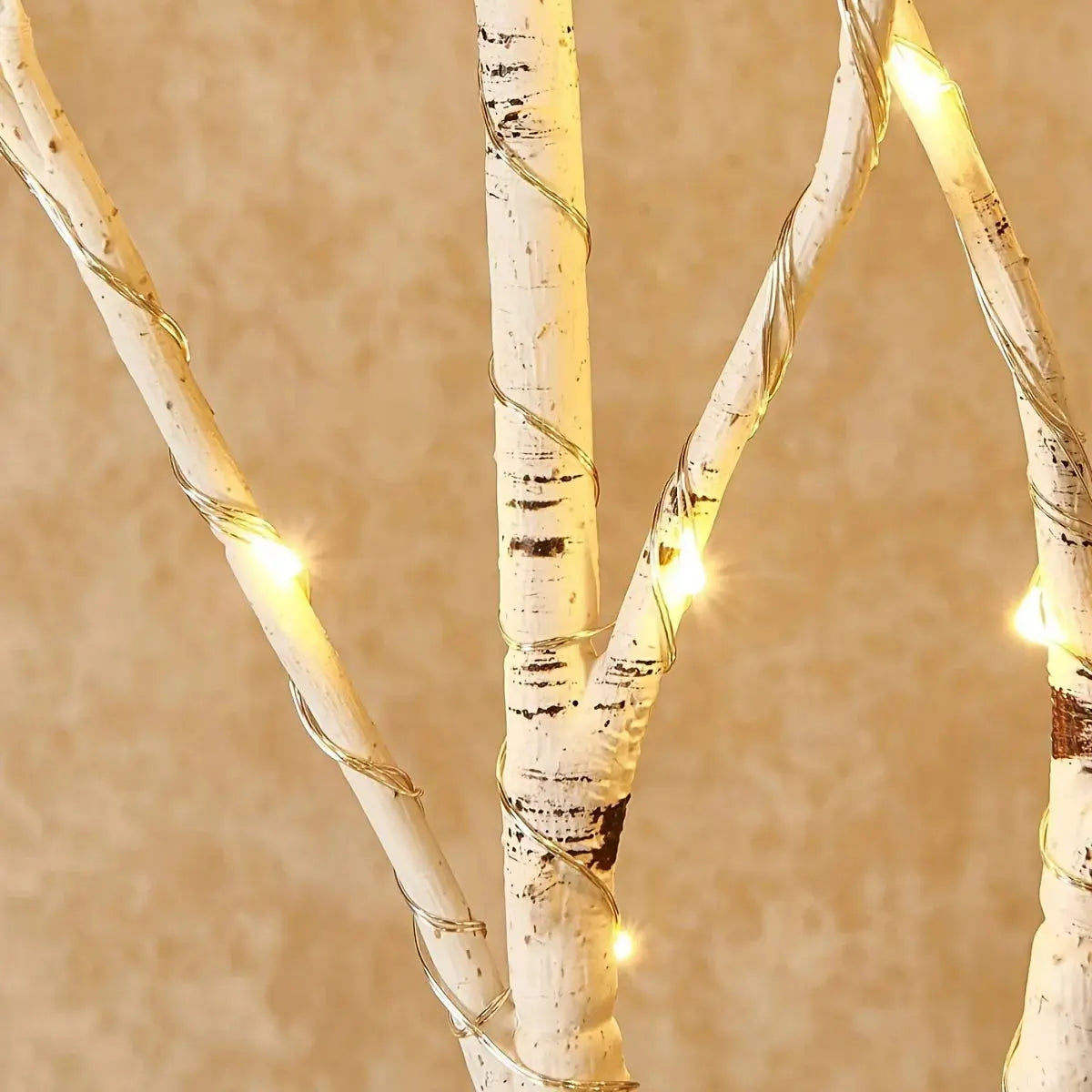 LED Illumination BrightBranch - Yelopi - Close-up of the Birch tree, showing the lit LED lights and the texture of the branch.