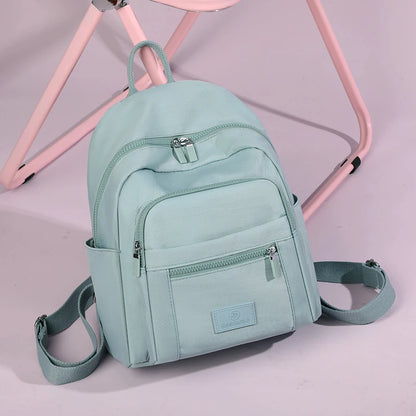 Cosmopolitan Carrier Backpack