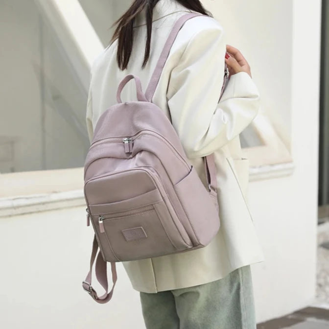 Cosmopolitan Carrier Backpack