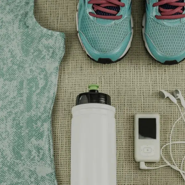 Yelopi_Sports_Acessories_Collection_A-pair-of-shoes-a-botlle-for-water-an-ipod-and-a-shirt