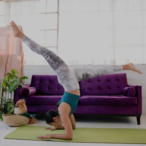 Yelopi_Yoga___Pilates_Collection_A pearson-doing-a-pose-pilates-at-home